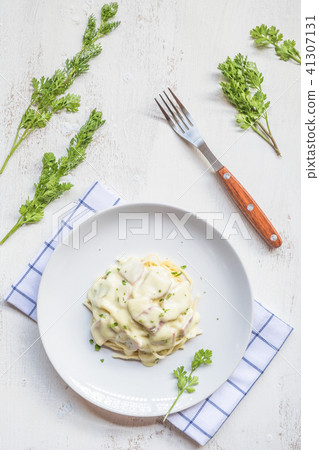Spaghetti pasta with bolognese sauce and parmesan  41307131