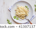 Spaghetti pasta with bolognese sauce and parmesan  41307137
