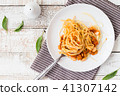Spaghetti pasta with bolognese sauce and parmesan  41307142