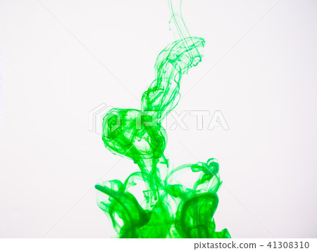 Green acrylic colour dissolving into water, close Green acrylic colour dissolving into water, close 41308310