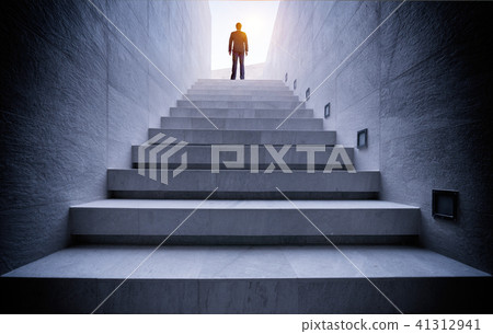 Businessman standing on stair 41312941