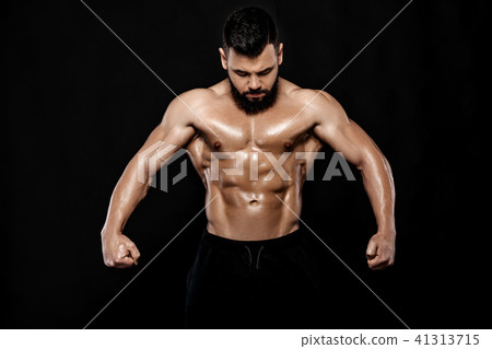 Handsome strong bodybuilder posing Handsome strong bodybuilder posing 41313715