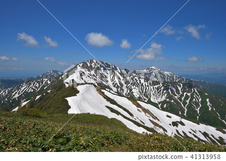 Echigo Misan of the remaining snow seen from Mt. Echigo Misan of the remaining snow seen from Mt. 41313958