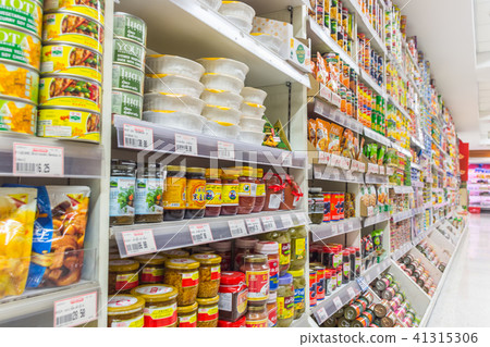 Many types of canned food products in supermarket 41315306