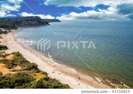 peaceful seascape with steep banks peaceful seascape with steep banks 41316924