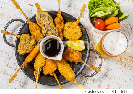 Deep fried skewers Deep-fried skewers Deep fried skewers Deep-fried skewers 41316933