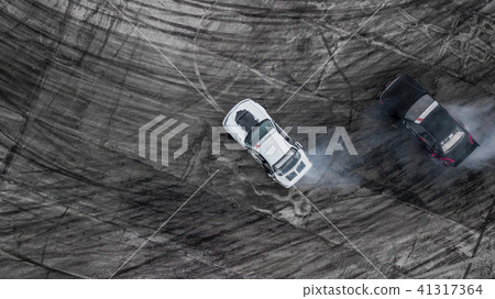Aerial top view car drifting battle, Two cars Aerial top view car drifting battle, Two cars 41317364