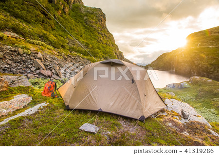 tourist tent in mountains summertime sunset Norway tourist tent in mountains summertime sunset Norway 41319286