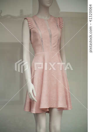 pink summer dress on mannequin in fashion store 41320064