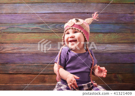 Little baby in a funny hat Little baby in a funny hat 41321409