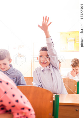 Active boy wants to give an answer Active boy wants to give an answer 41322304