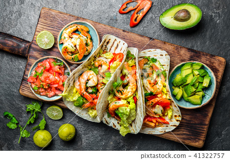 Shrimps tacos with salsa, vegetables and avocado. Mexican food 41322757