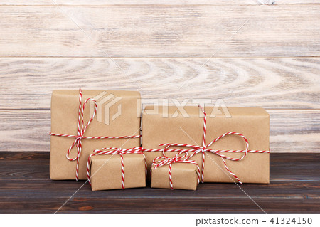 Image of handmade gift boxes on wooden table Image of handmade gift boxes on wooden table 41324150