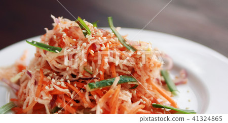 Vegan salad with carrot and radish. Asian cuisine. 41324865