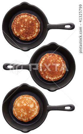 Set of three various pancakes on a frying pan 41325799