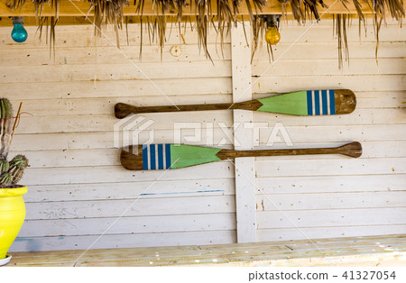 Canoe paddles hanging on the wall. Canoe paddles hanging on the wall. 41327054