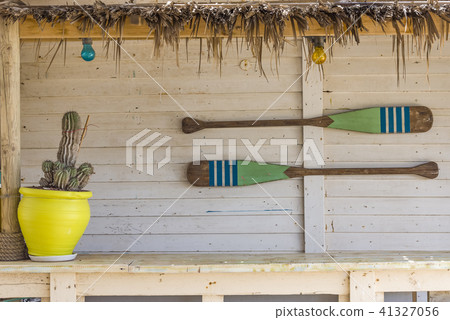 Canoe paddles hanging on the wall. Canoe paddles hanging on the wall. 41327056