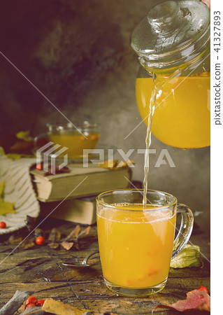 Sea buckthorn tea in a glass cup Sea buckthorn tea in a glass cup 41327893