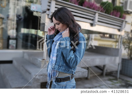 Beautiful young woman is walking Beautiful young woman is walking 41328631