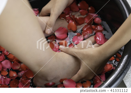 Foot spa massage treatment in luxury spa resort. 41331112
