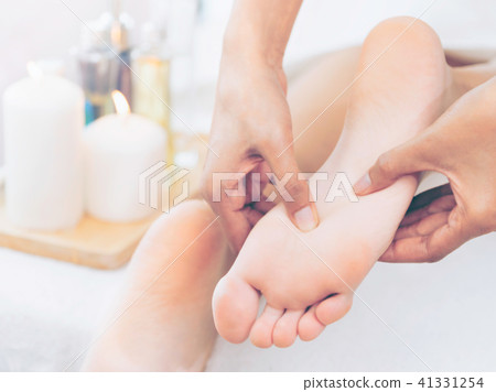 Foot spa massage treatment in luxury spa resort. Foot spa massage treatment in luxury spa resort. 41331254