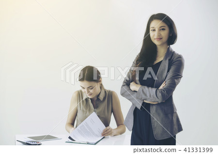 Young employee and manager in meeting at office. 41331399