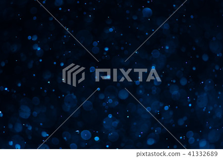 Abstract blue bokeh with black background Abstract blue bokeh with black background 41332689