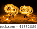 twin fire twirlers with dual circular fire rods 41332889