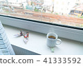 relaxing hot tea, crane origami and railroad view  41333592