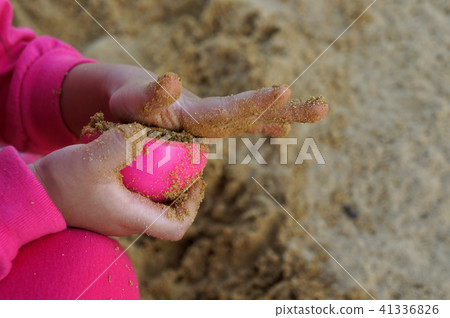little girl playing toys with sand, A view of hand little girl playing toys with sand, A view of hand 41336826