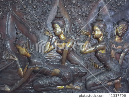 Angel statue on the temple wall. 41337706