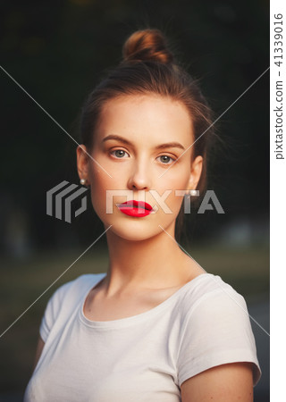 beautiful blonde girl on the street 41339016