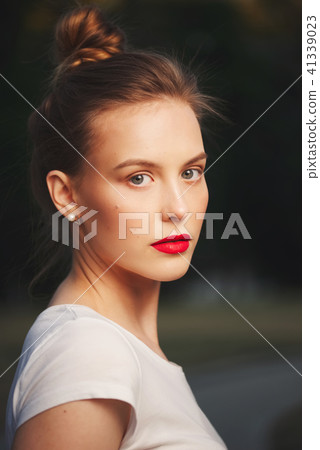 beautiful blonde girl on the street 41339023