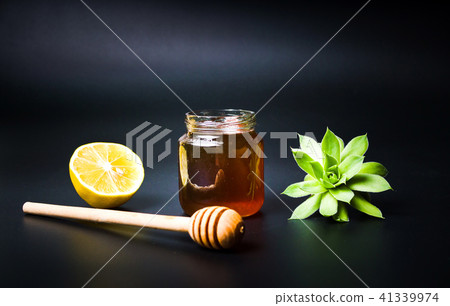 Jar of honey and lemon with houseleek Jar of honey and lemon with houseleek 41339974