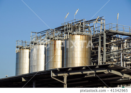 Silver wine Silos with blue sky in background Silver wine Silos with blue sky in background 41342965