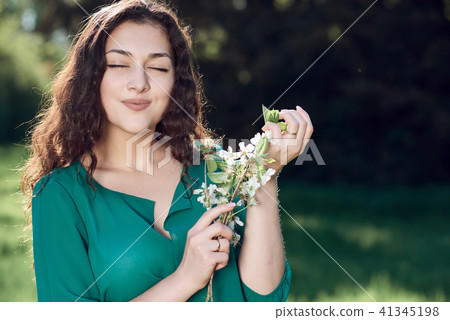 beautiful woman posing in summer forest beautiful woman posing in summer forest 41345198