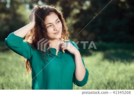 beautiful woman posing in summer forest 41345208