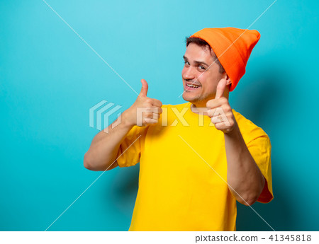 man showing a hand gesture fingers up 41345818