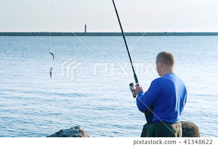 fishing on a Salak, a man caught a fish 41348622