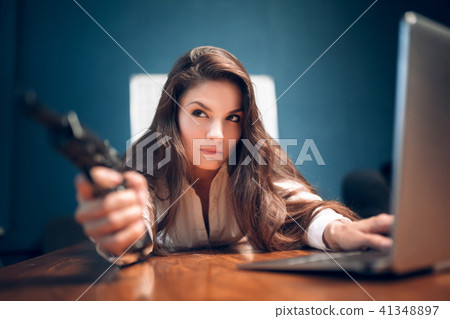 Business woman lying on table. Business woman lying on table. 41348897