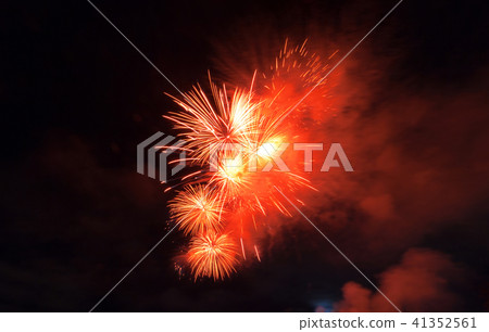 Fireworks light up close-up against dark sky Fireworks light up close-up against dark sky 41352561