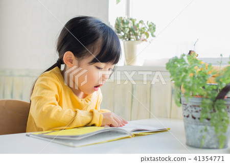 Children reading a picture book Children reading a picture book 41354771
