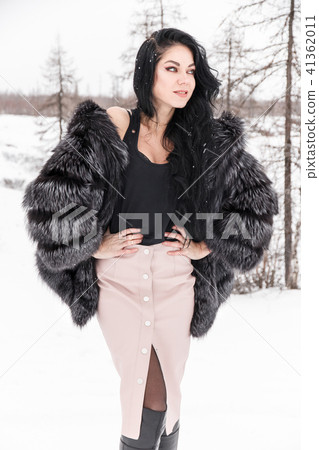 Woman in a winter forest Woman in a winter forest 41362011