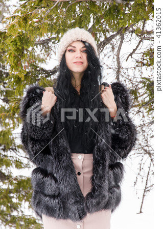 Woman in a winter forest Woman in a winter forest 41362015