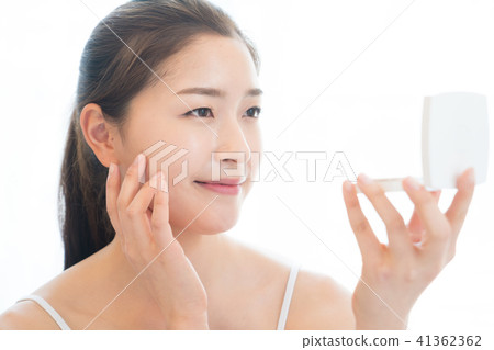 Woman sitting in the living room Woman sitting in the living room 41362362
