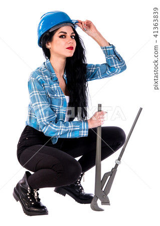 Woman with a heavy-duty straight pipe wrench 41363839