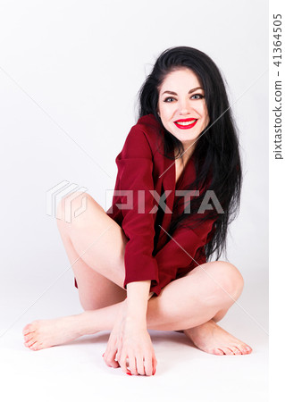 Young woman in a purple suit Young woman in a purple suit 41364505