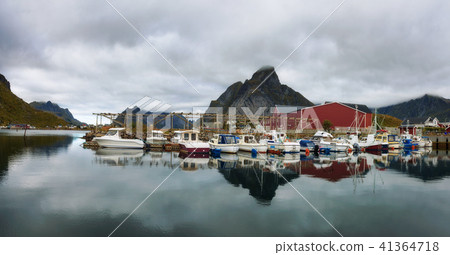 Fishing boats at the port of Reine village on Lofoten islands in Norway 41364718