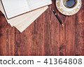 Cup of coffee, open notebook and pen 41364808