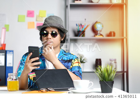 Stylish Young Professional Checking Smartphone 41365011